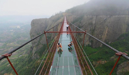 Feeling intrepid? China's new glass bridge sways with the wind