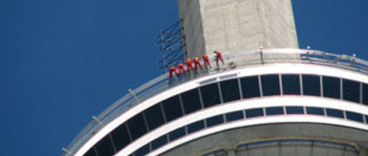 Daredevils dangle from the edge of Toronto's CN Tower
