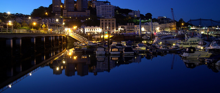 Day breaks over the picturesque Torquay harbour