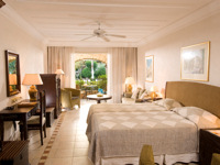 The suites' neutral tones reflect the cliff surroundings