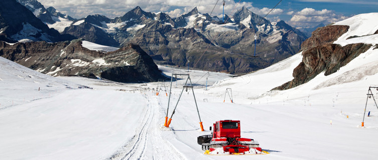 A snow plough in action in Zermatt
