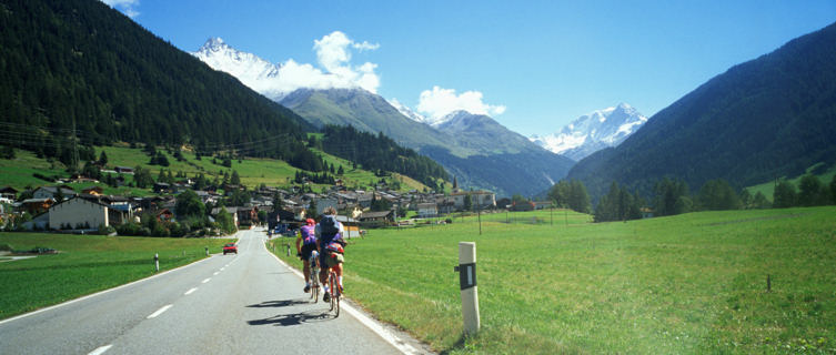 Cycle past beautiful scenery in Switzerland