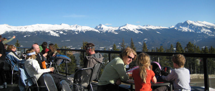Skiers take a break in Marmot Basin ski hill, Jasper