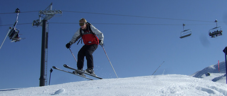 Skiier gets some air, Coronet Peak